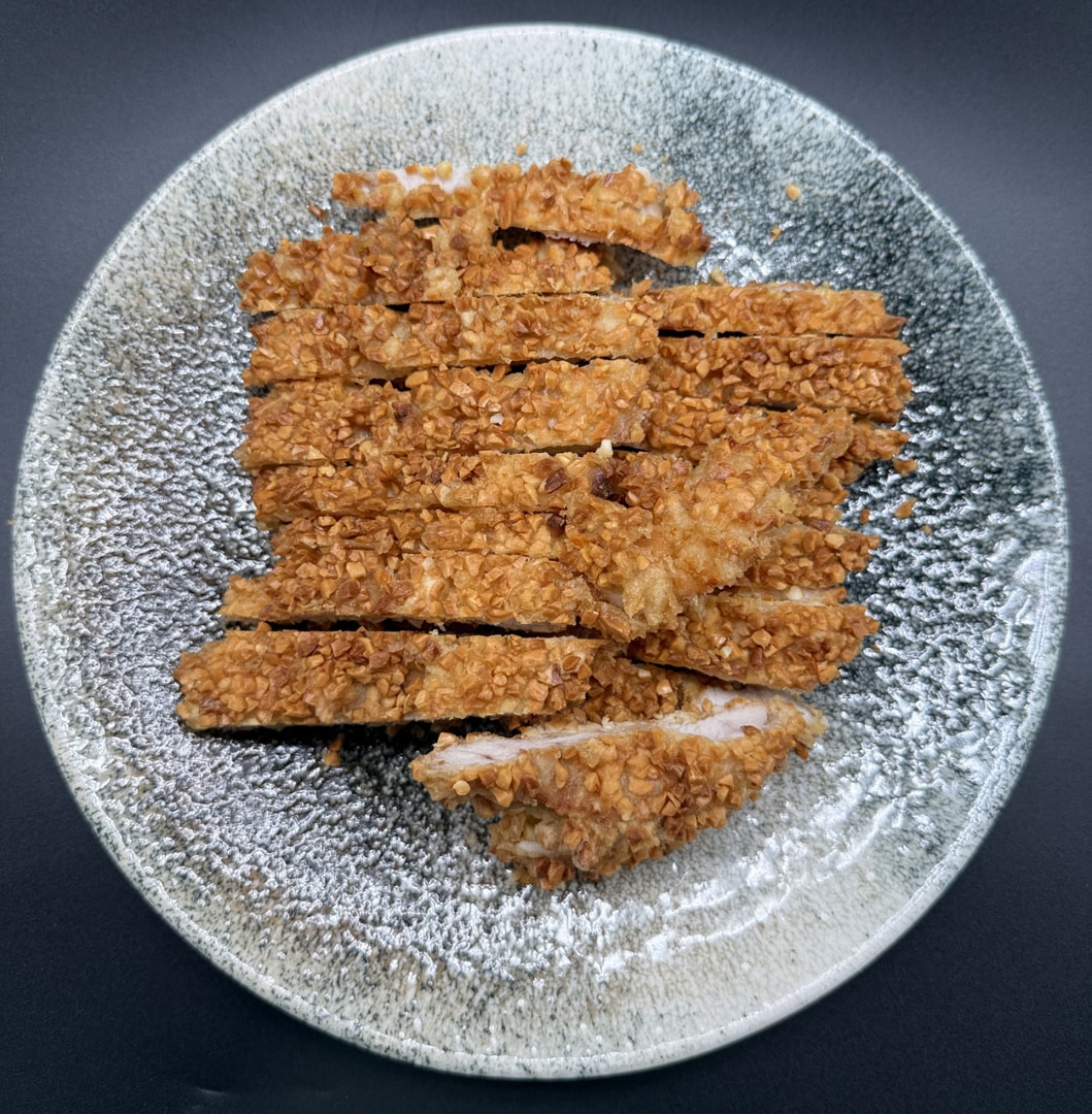 28 Pollo rebozado con almendras